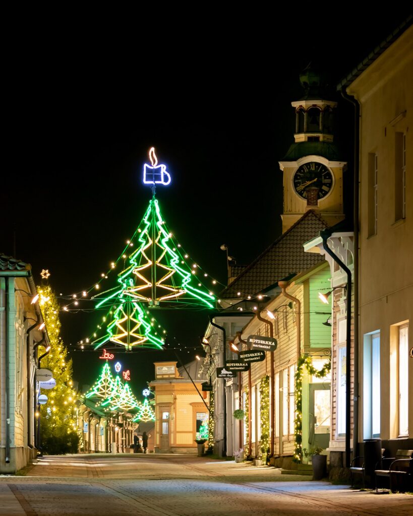 The picture shows an illuminated street in Old Rauma