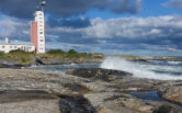 Waves hitting the cliffs of Kylmäpihlaja lighthouse island as seen from the cliffs