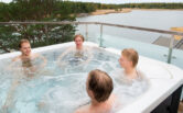 Four people in jacuzzi of Helmiranta.