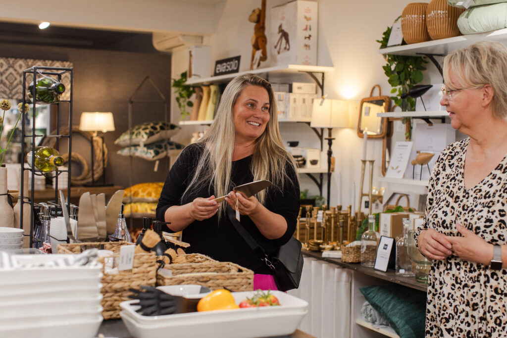 A woman in a boutique.