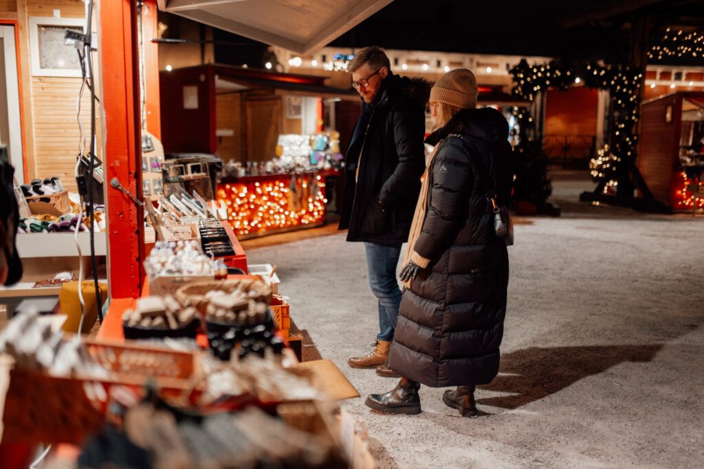 A woman and a man at Rauma's Christmas Market.